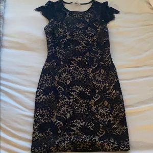 Black and nude lace cocktail dress